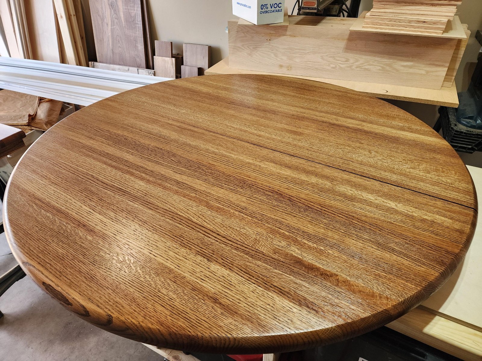 circular oak tabletop after refinishing