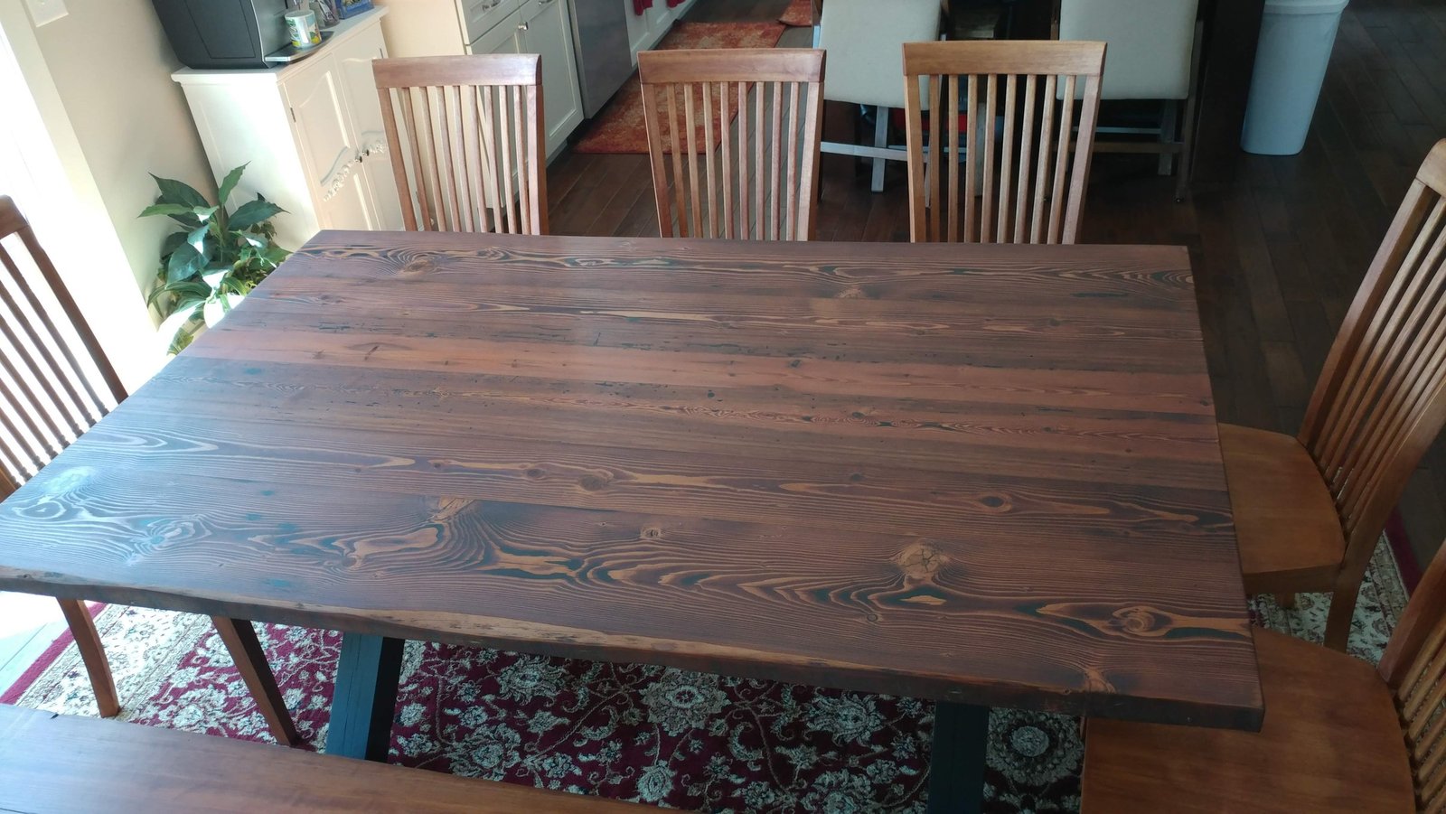dark rustic plank dining table after