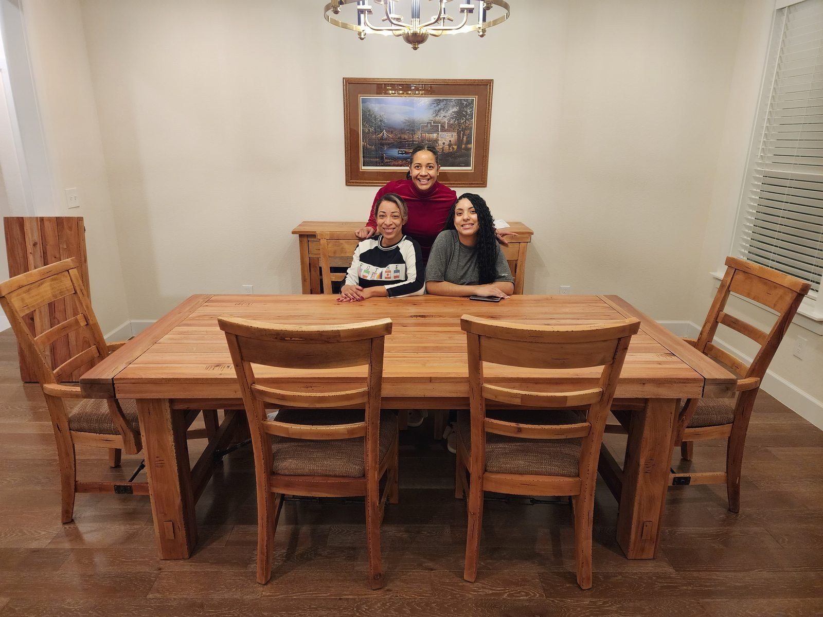 Refinished family harvest table and chairs staged in the dining room