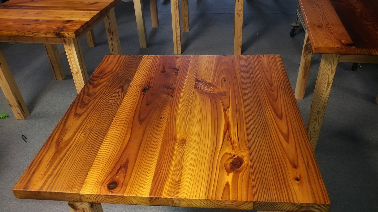 golden pine square table after refinishing