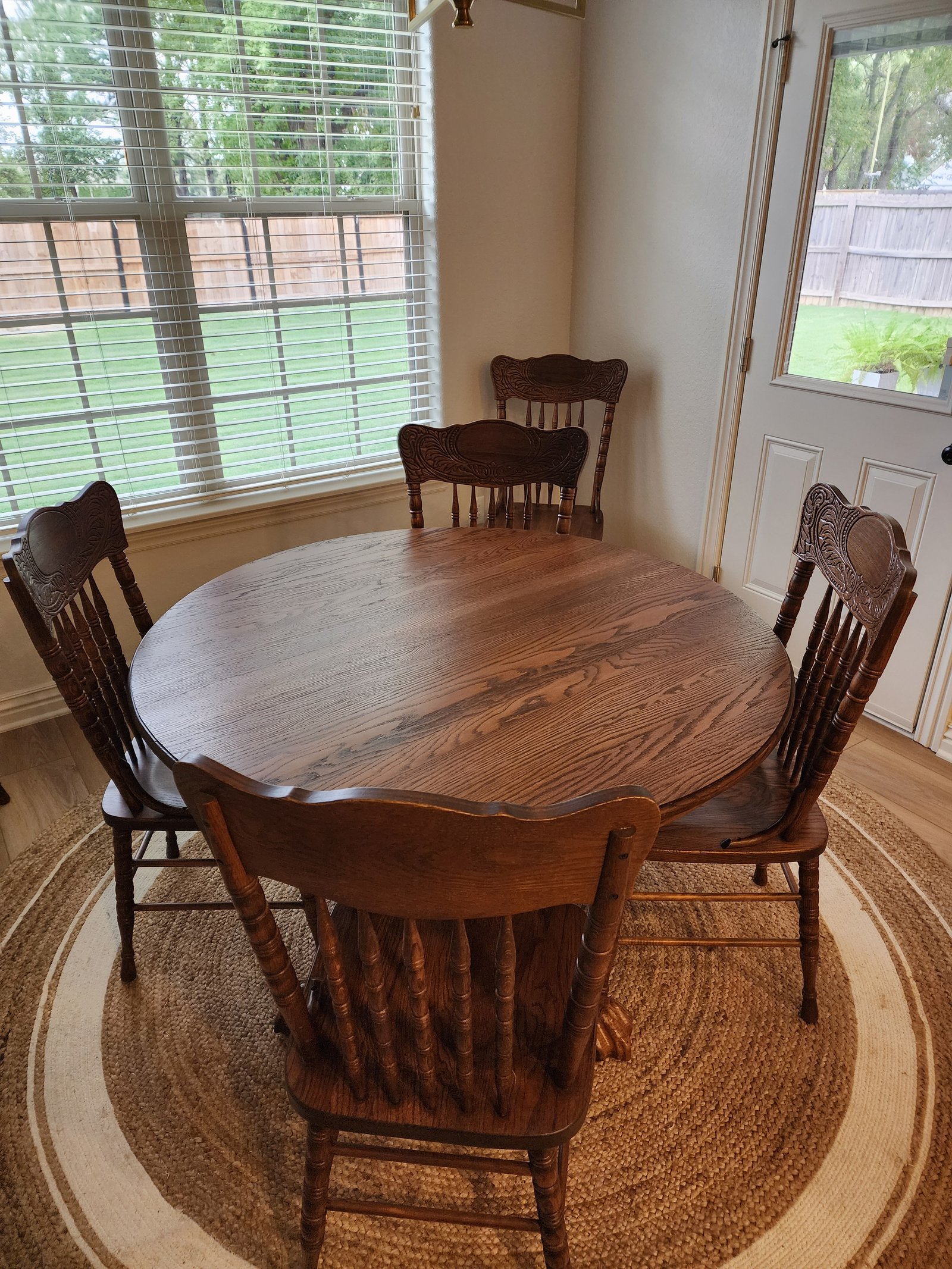 round oak pedestal table and chairs after refinishing