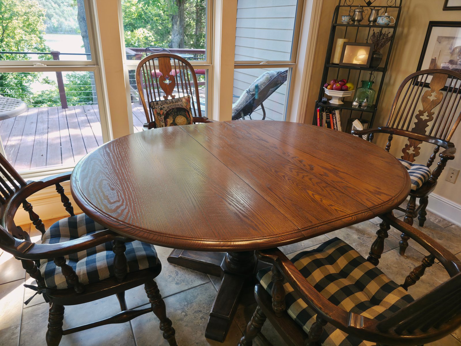 round oak pedestal table and windsor chairs after refinishing