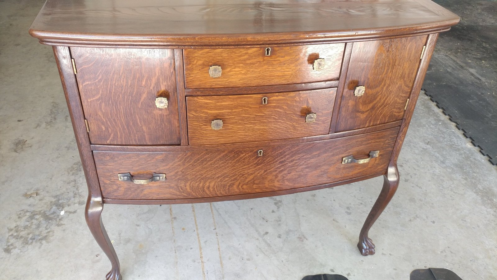 antique bow front buffet before restoration