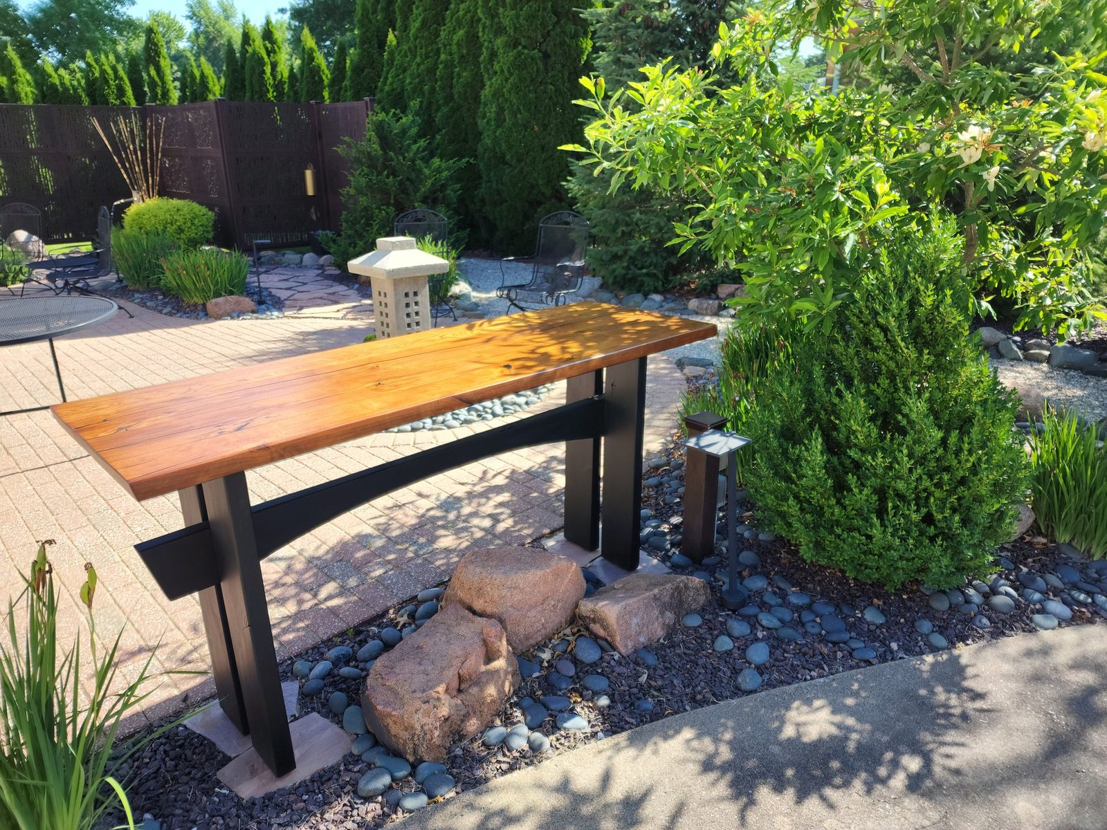outdoor console table wood and steel after refinishing