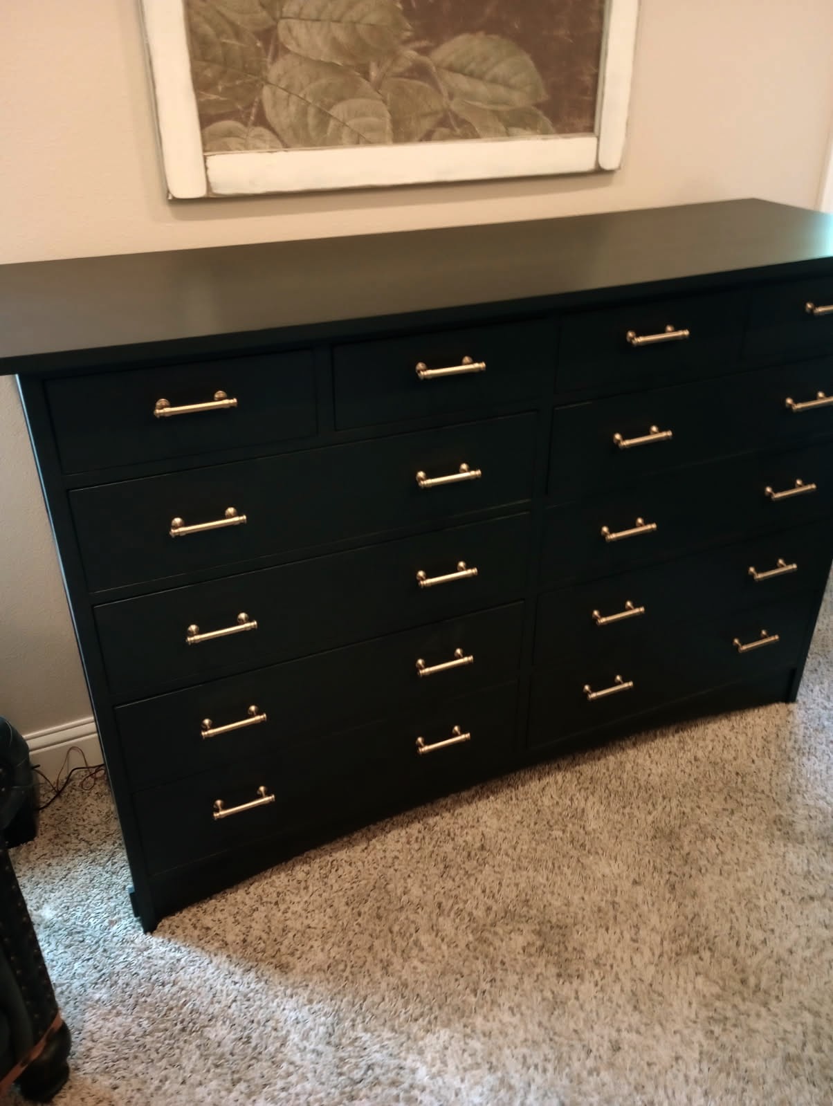 Large dresser refinished in a smooth matte black finish.