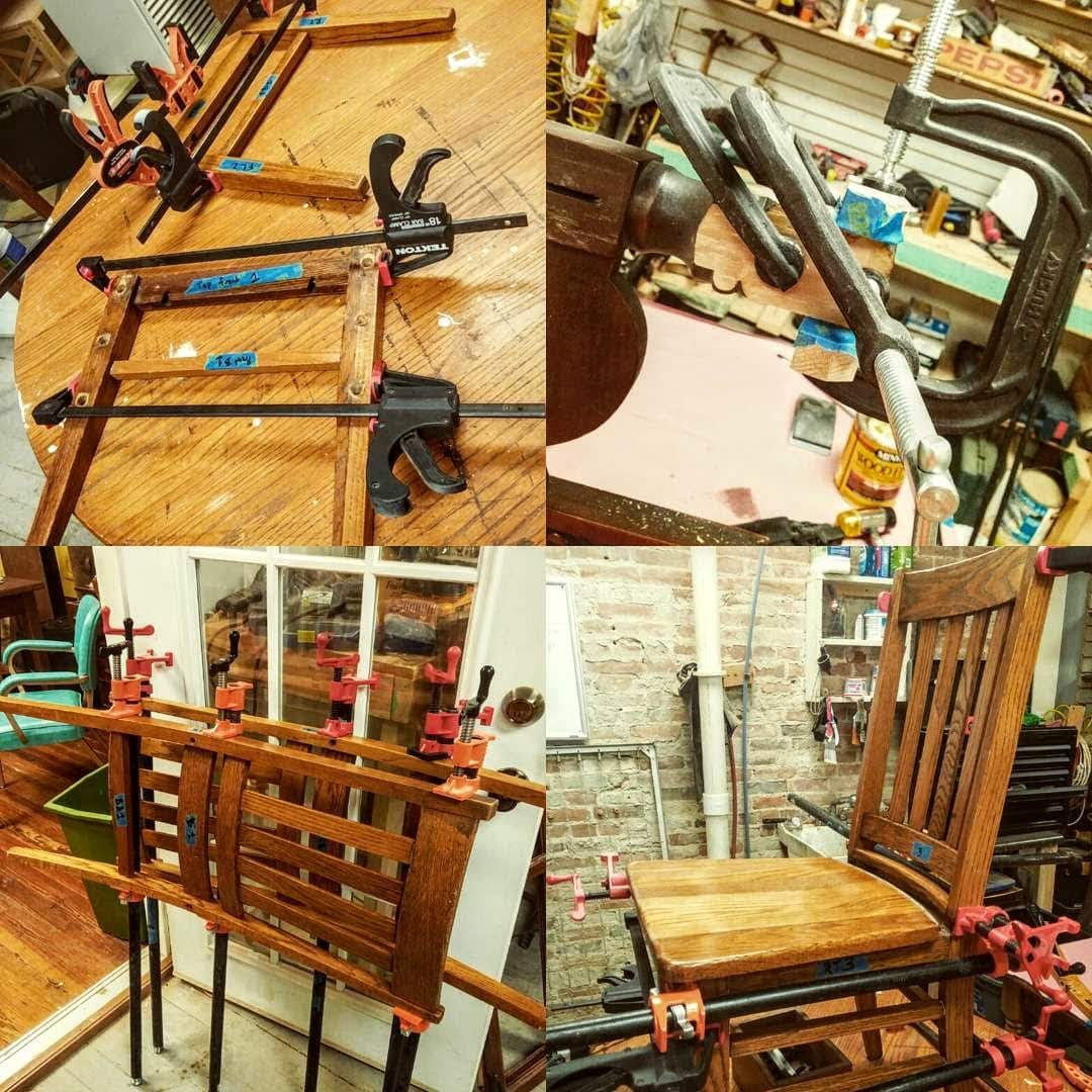 Wooden dining chair being repaired and clamped during structural restoration.